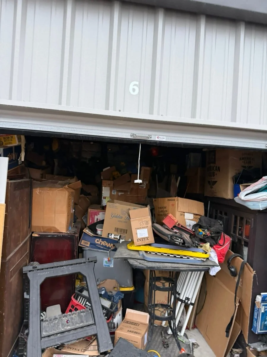 Storage unit full of boxes and furniture